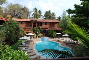 Bazén v ubytování Sea Breeze Beach Resort Candolim, Goa nebo v jeho okolí
