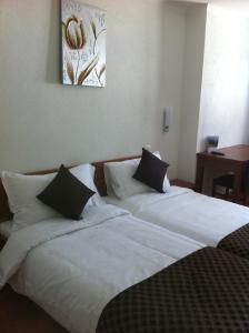 Postel nebo postele na pokoji v ubytování Hotel de la Lande