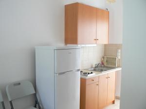 Kuchyňa alebo kuchynka v ubytovaní Aggeliko