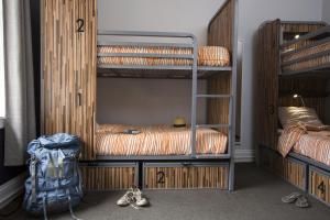 a bunk bed with two bunk beds in a room at HI San Francisco Downtown Hostel in San Francisco