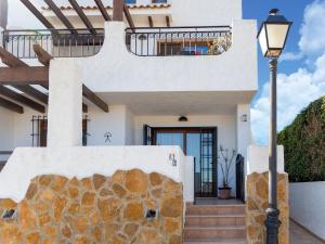 A balcony or terrace at Apartment in Palomares near the Beach
