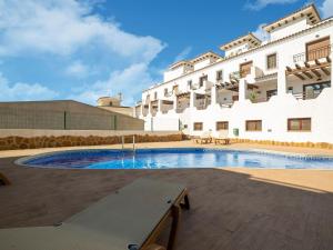 The swimming pool at or close to Apartment in Palomares near the Beach