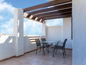 A balcony or terrace at Apartment in Palomares near the Beach