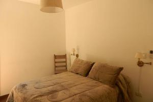 Кровать или кровати в номере Patio del Bastion