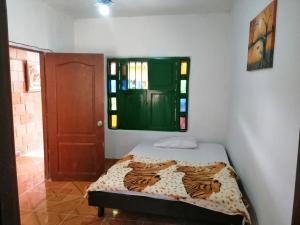 Säng eller sängar i ett rum på Hosteria los Cristales