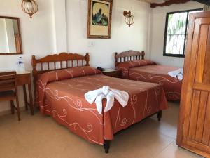 Postel nebo postele na pokoji v ubytování Arcos hotel