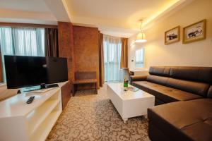 Televisyen dan/atau pusat hiburan di Hotel New Star