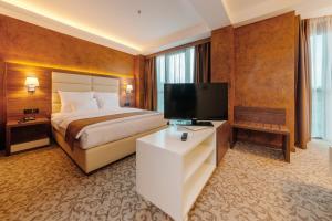 Televisyen dan/atau pusat hiburan di Hotel New Star