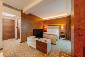 Televisyen dan/atau pusat hiburan di Hotel New Star