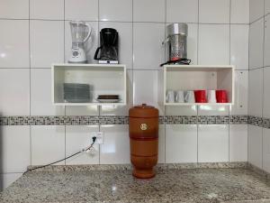 Virtuvė arba virtuvėlė apgyvendinimo įstaigoje Taipas Pousada e Camping