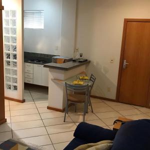 Nhà bếp/bếp nhỏ tại Differential Flat por temporada próximo Hospital Biocor Vila da Serra