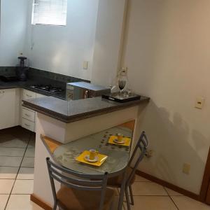 Nhà bếp/bếp nhỏ tại Differential Flat por temporada próximo Hospital Biocor Vila da Serra