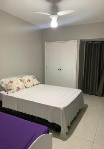 Voodi või voodid majutusasutuse Apartamento Pé na Areia - Santos toas