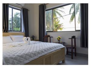 Tempat tidur dalam kamar di Chamisland Hanhly homestay