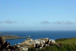 a view of the ocean from the top of a mountain at Clifden Bay Lodge in Clifden