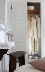 A bed or beds in a room at Altana Heritage Suites