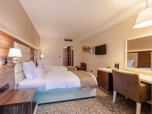 Katil atau katil-katil dalam bilik di Hotel New Star