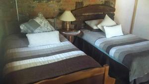 Ένα ή περισσότερα κρεβάτια σε δωμάτιο στο Waboom Farm Stay
