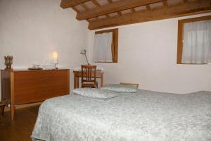 Postel nebo postele na pokoji v ubytování Agriturismo Marani