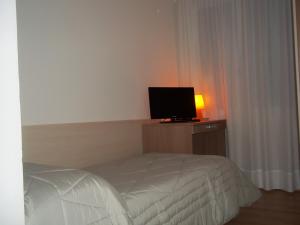 TV a/nebo společenská místnost v ubytování Hotel Gronda Lagunare