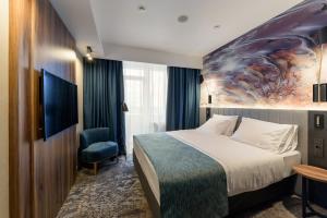 Cama o camas de una habitación en Park Hotel City
