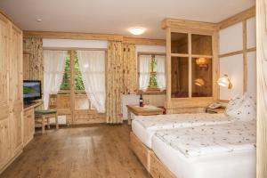 En eller flere senger på et rom på Hotel-Gasthof "Zur Mühle"