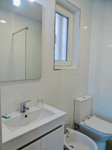 
A bathroom at Poveira Hotel
