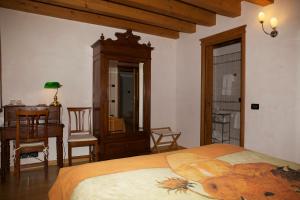 Postel nebo postele na pokoji v ubytování Agriturismo Marani