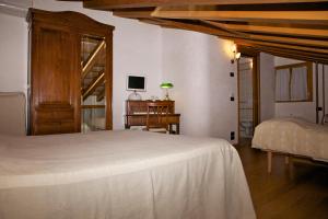 Postel nebo postele na pokoji v ubytování Agriturismo Marani