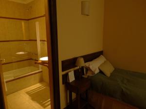 Ein Bett oder Betten in einem Zimmer der Unterkunft Infinito Sur