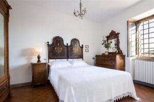 Postel nebo postele na pokoji v ubytování B&B San Gimignano Diffuso