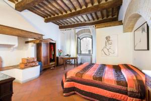 Posteľ alebo postele v izbe v ubytovaní B&B San Gimignano Diffuso
