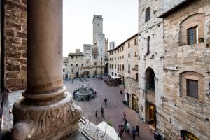 Nespecifikovaný výhled na destinaci San Gimignano nebo výhled na město při pohledu z bed and breakfast