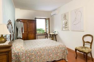 Postel nebo postele na pokoji v ubytování B&B San Gimignano Diffuso