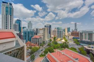 a view of a city skyline with tall buildings at Republic Apartments Brisbane City in Brisbane