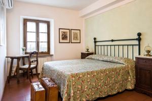 Postel nebo postele na pokoji v ubytování B&B San Gimignano Diffuso