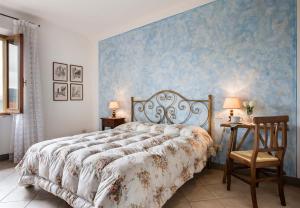 Postel nebo postele na pokoji v ubytování B&B San Gimignano Diffuso