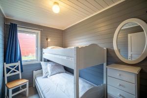 
En eller flere køyesenger på et rom på Hustadvika Guesthouse - by Classic Norway Hotels
