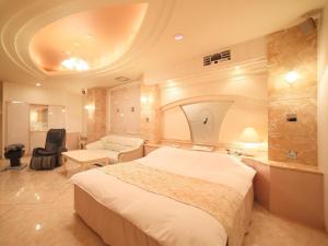Katil atau katil-katil dalam bilik di Hotel Fine Tsu