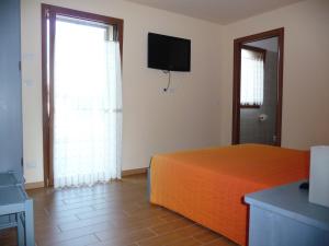 Кровать или кровати в номере Villa Patrizia