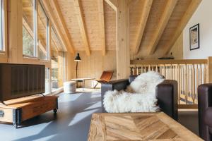 Ruang duduk di Ferienhaus Alpen Lodge und die Gams