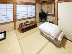 Kuchyň nebo kuchyňský kout v ubytování Fujiya Ryokan