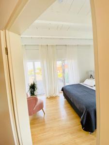 Postel nebo postele na pokoji v ubytování Ferienhaus No. 4