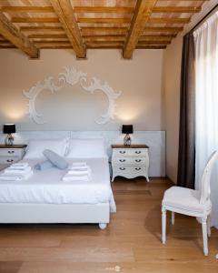 Posteľ alebo postele v izbe v ubytovaní Villa Anitori Prestige Relais & Spa
