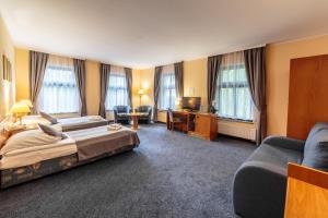Postel nebo postele na pokoji v ubytování Hotel Fenix + 36 fotografií