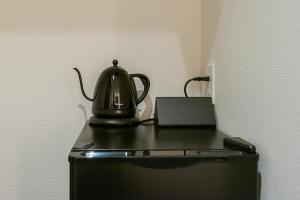 Set per la preparazione di tè e caffè presso Seiei Hotel Kyoto Kawaramachi