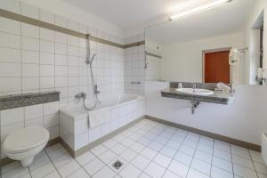 Koupelna v ubytování Hotel Fenix