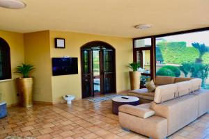 A television and/or entertainment centre at Villa Grisì