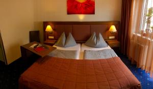 Letto o letti in una camera di Gasthof Süss