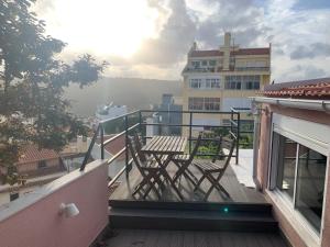 Балкон или терраса в Studio ensoleillé avec terrasse proche d'Amoreiras